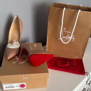 Christian Louboutin Beige Heels with Red Soles